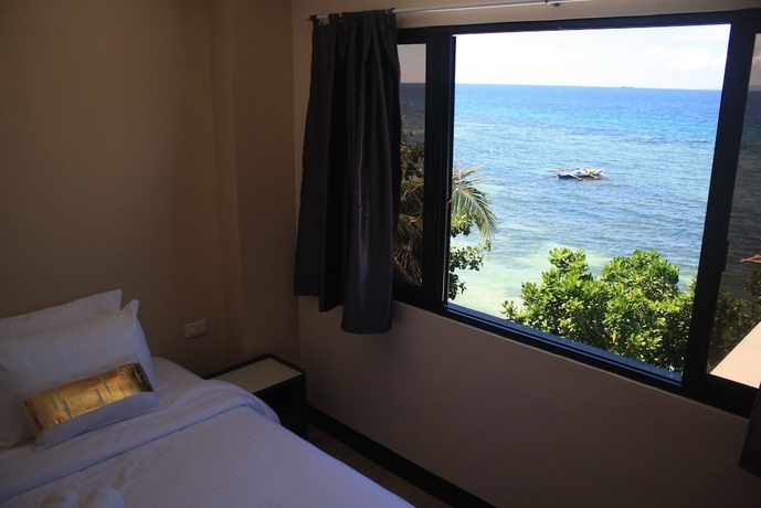 Imagen de la habitación del Hotel Babylon Oslob Coast Guesthouse. Foto 9