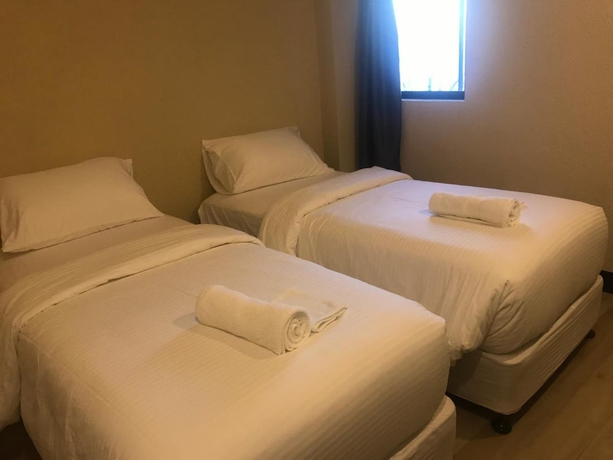 Imagen de la habitación del Hotel Babylon Oslob Coast Guesthouse. Foto 12