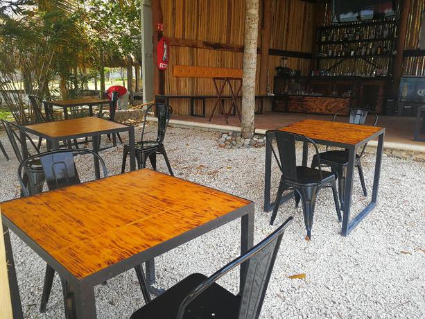 Imagen del bar/restaurante del Hotel Bacalar 777 Boutique. Foto 13