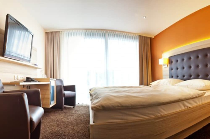 Imagen de la habitación del Hotel Bacchus, Bensheim. Foto 13