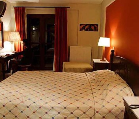 Imagen de la habitación del Hotel Bacchus, Olimpia. Foto 15