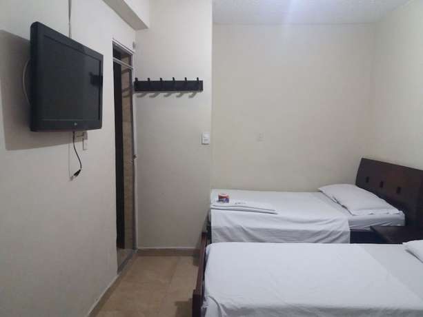 Imagen de la habitación del Hotel Bachue. Foto 10