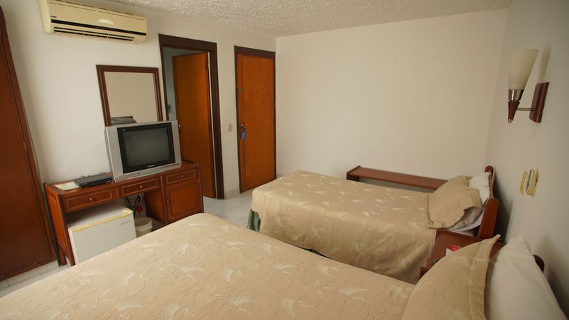 Imagen de la habitación del Hotel Bachue Girardot. Foto 4