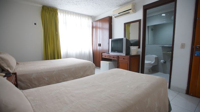 Imagen de la habitación del Hotel Bachue Girardot. Foto 9