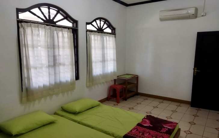 Imagen de la habitación del Hotel Baciro Homestay46. Foto 19