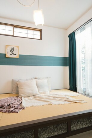 Imagen de la habitación del Hotel Back to 90s American Style House. Foto 29