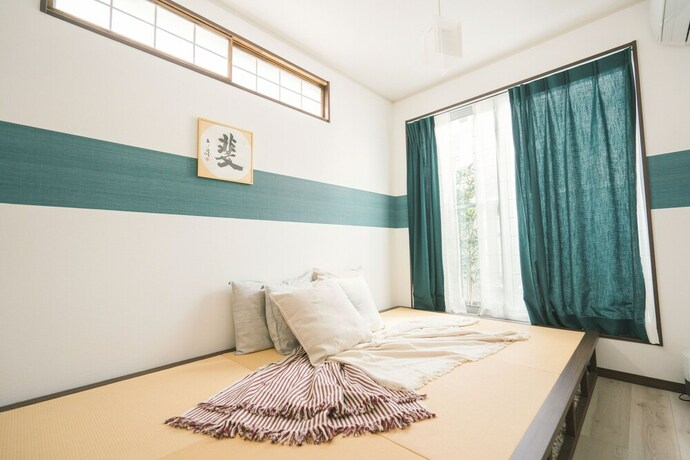 Imagen de la habitación del Hotel Back to 90s American Style House. Foto 31