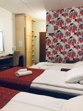 Imagen de la habitación del Hotel Backby Manor. Foto 10