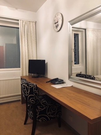 Imagen de la habitación del Hotel Backby Manor. Foto 12