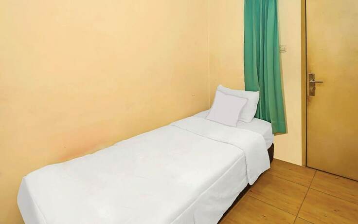 Imagen de la habitación del Hotel Backpacker Homestay Cibubur by PEKOTEL. Foto 5