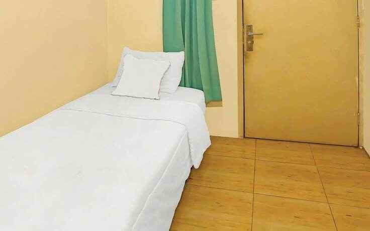 Imagen de la habitación del Hotel Backpacker Homestay Cibubur by PEKOTEL. Foto 7