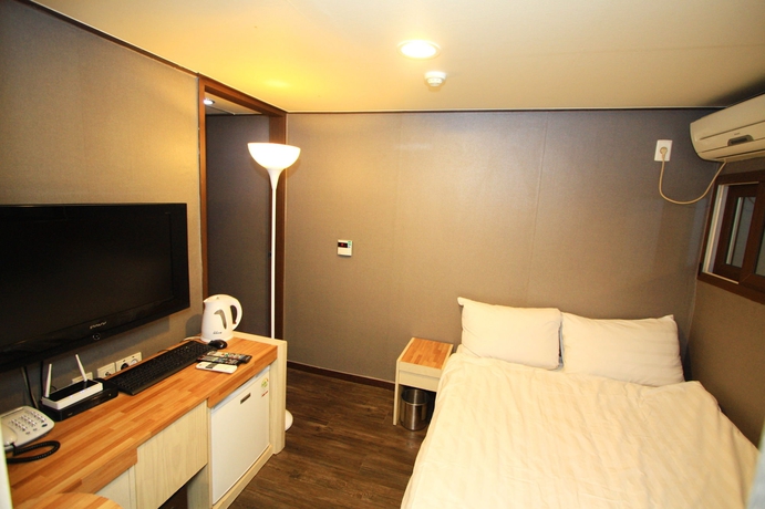 Imagen de la habitación del Hotel Backpacker Mr.Sea. Foto 14