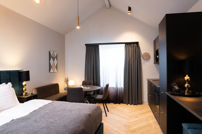 Imagen de la habitación del Hotel Backyard Apartments. Foto 4