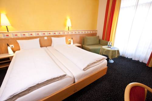 Imagen de la habitación del Hotel Badehotel Belvair. Foto 3