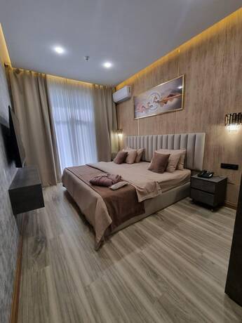 Imagen de la habitación del Hotel Badem Garden, Taskent. Foto 19