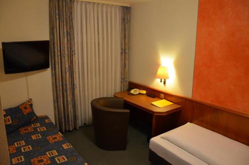 Imagen de la habitación del Hotel Badischer Hof, Tauberbischofsheim. Foto 5