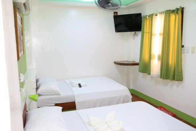 Imagen de la habitación del Hotel Badladz Beach Resort. Foto 18