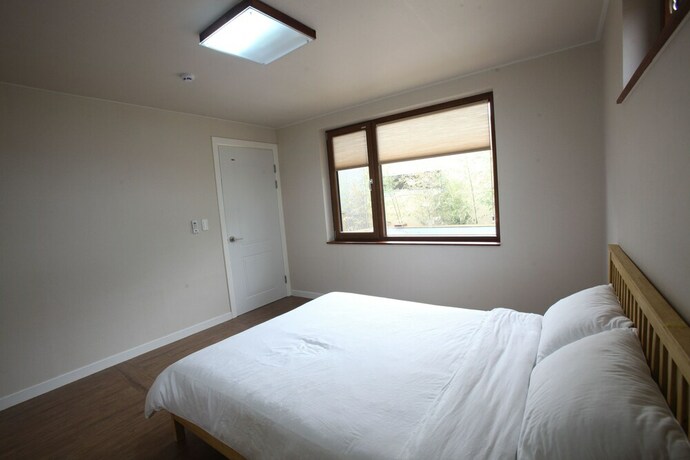 Imagen de la habitación del Hotel Baettorong Jinni. Foto 33
