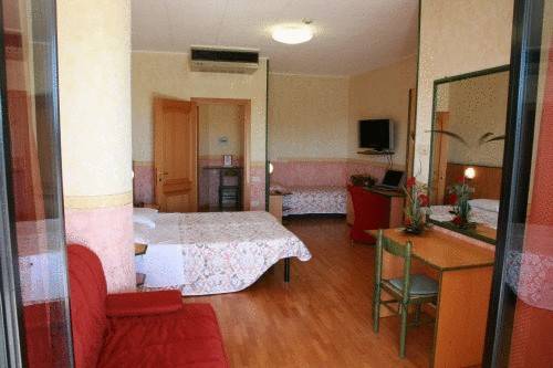 Imagen de la habitación del Hotel Baffo Rosso. Foto 14