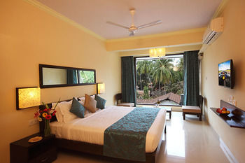 Imagen de la habitación del Hotel Baga Deck Comforts. Foto 12