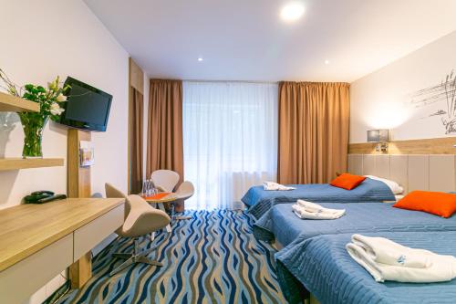 Imagen de la habitación del Hotel Baginscy Spa. Foto 3