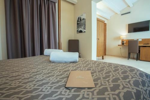 Imagen de la habitación del Hotel Baglio Sorìa Resort & Wine Experience. Foto 6