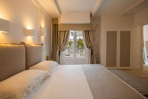 Imagen de la habitación del Hotel Baglioni Masseria Muzza. Foto 16