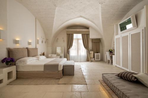 Imagen de la habitación del Hotel Baglioni Masseria Muzza. Foto 17
