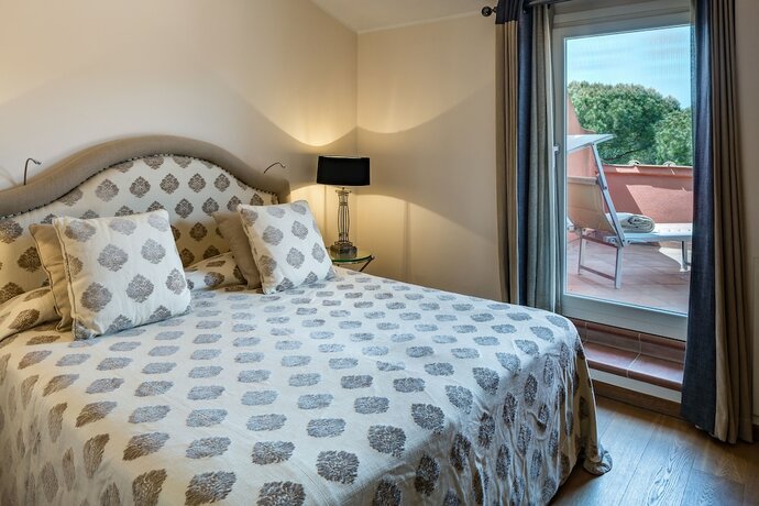 Imagen de la habitación del Hotel Baglioni Resort Alleluja. Foto 17