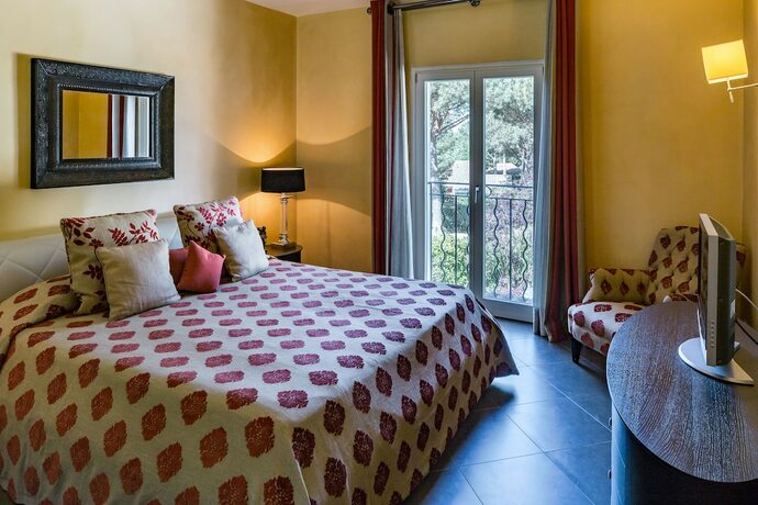 Imagen de la habitación del Hotel Baglioni Resort Alleluja. Foto 18