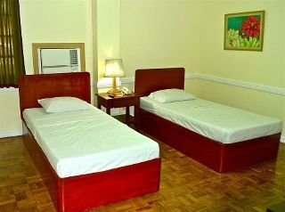 Imagen de la habitación del Hotel Bagobo House Hotel. Foto 13