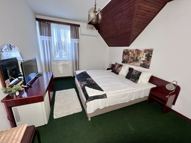 Imagen de la habitación del Hotel Bagoly Fogadó. Foto 13