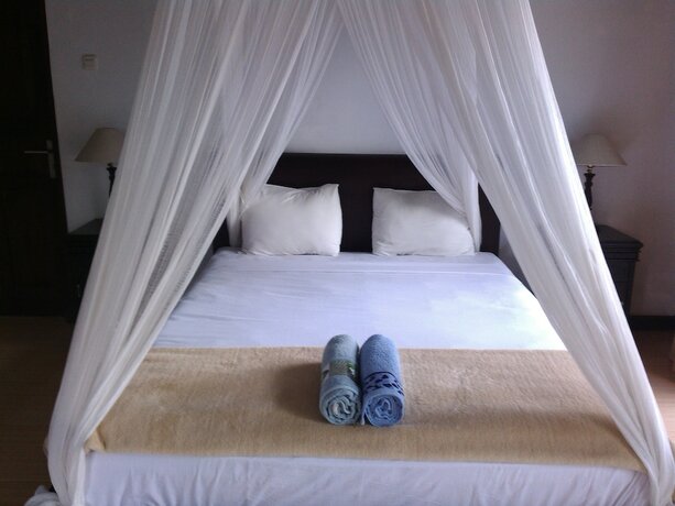 Imagen de la habitación del Hotel Bagus Homestay Pemuteran. Foto 18