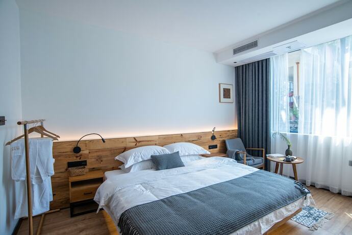 Imagen de la habitación del Hotel Bahaobieyuan. Foto 2