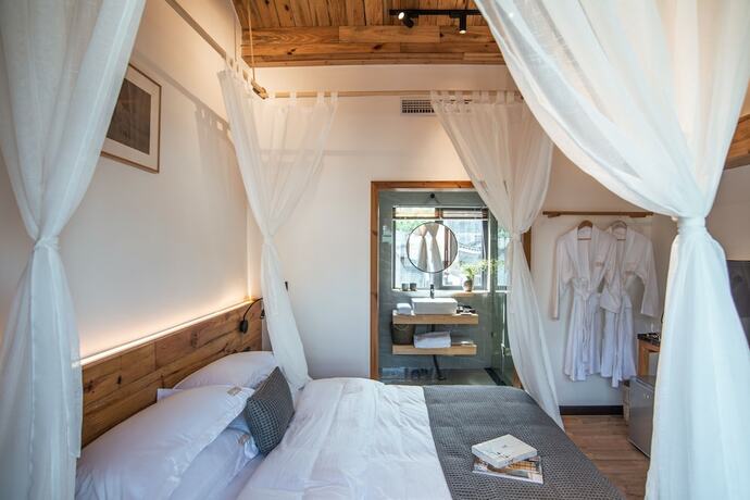 Imagen de la habitación del Hotel Bahaobieyuan. Foto 4