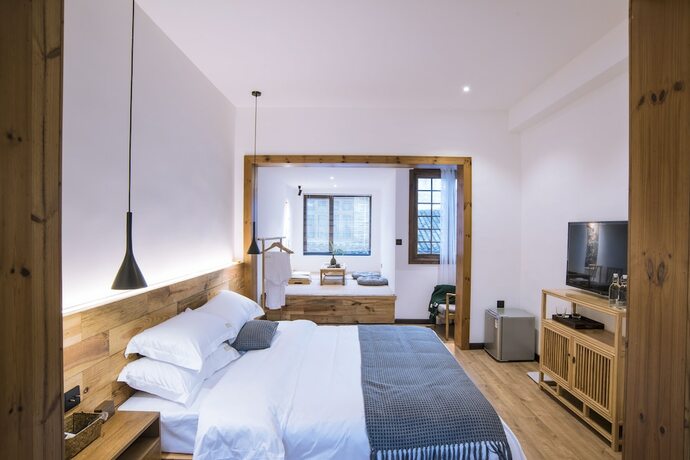 Imagen de la habitación del Hotel Bahaobieyuan. Foto 5