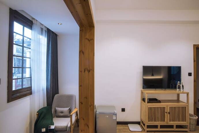 Imagen de la habitación del Hotel Bahaobieyuan. Foto 11