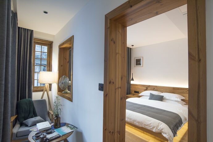 Imagen de la habitación del Hotel Bahaobieyuan. Foto 13