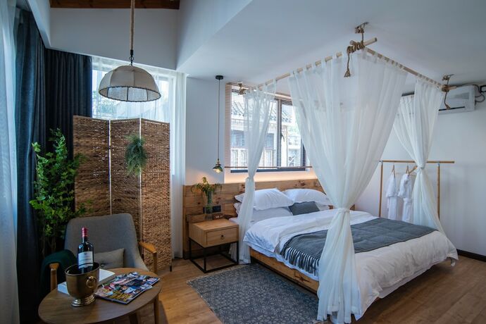 Imagen de la habitación del Hotel Bahaobieyuan. Foto 16