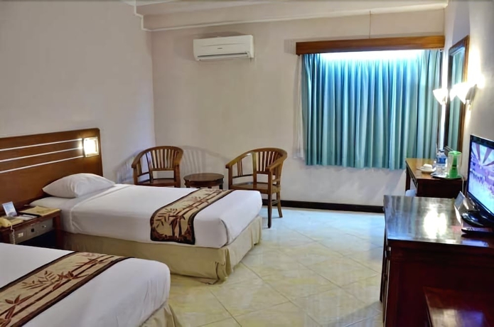 Imagen de la habitación del Hotel Bahari Inn Tegal. Foto 2