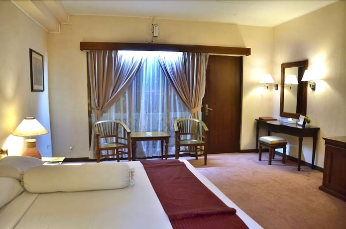 Imagen de la habitación del Hotel Bahari Inn Tegal. Foto 7