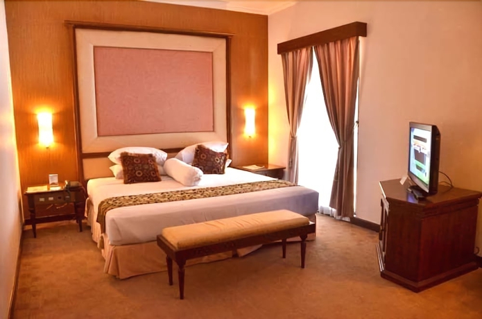 Imagen de la habitación del Hotel Bahari Inn Tegal. Foto 8