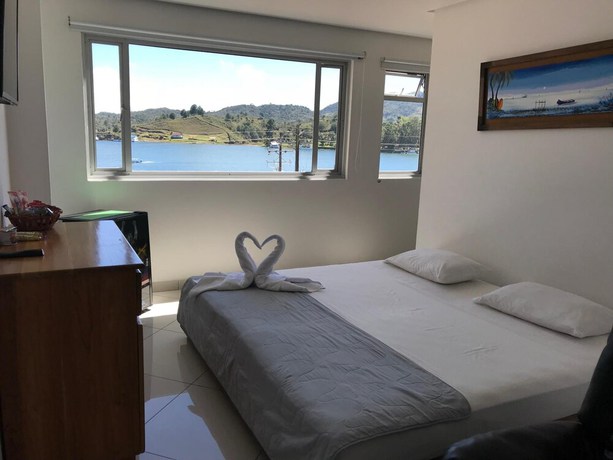 Imagen de la habitación del Hotel Bahia Guatape. Foto 7