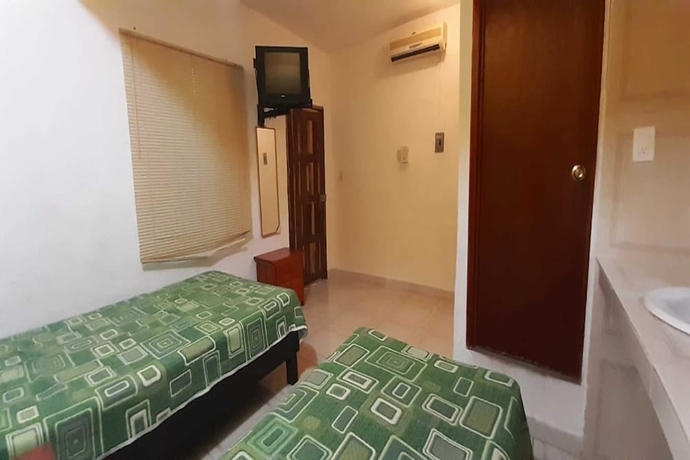 Imagen de la habitación del Hotel Bahia San Carlos. Foto 13