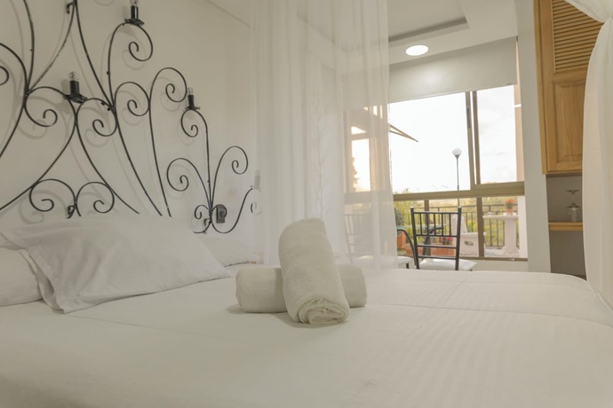 Imagen de la habitación del Hotel Bah&iacute;a Del Faro. Foto 7