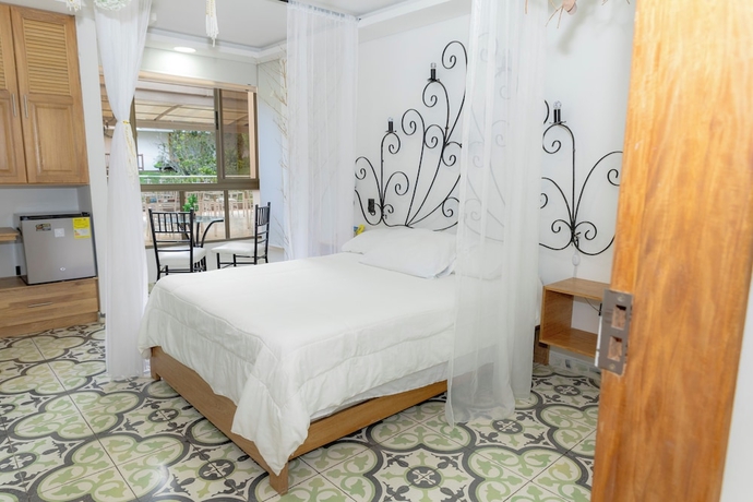 Imagen de la habitación del Hotel Bah&iacute;a Del Faro. Foto 8