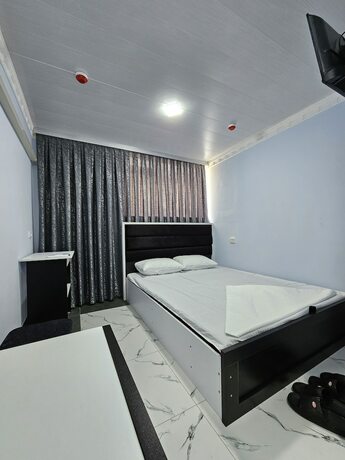 Imagen de la habitación del Hotel Bahra. Foto 20