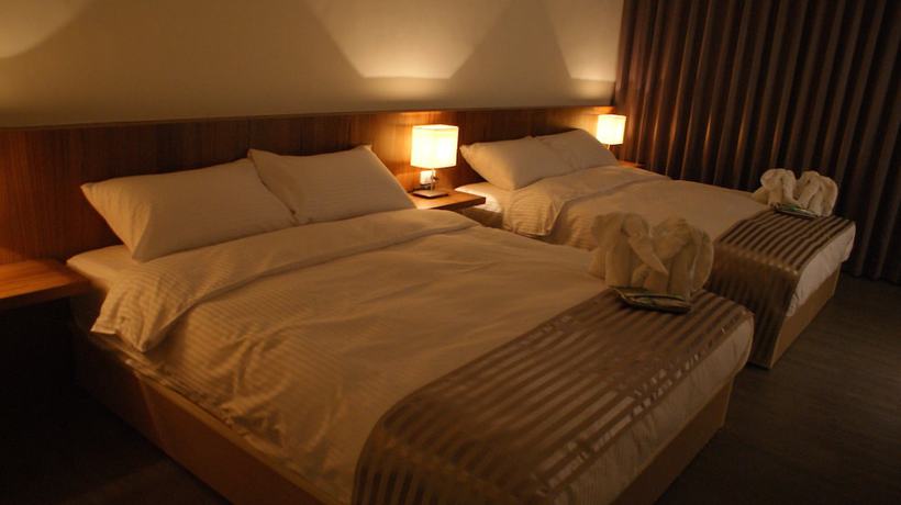 Imagen de la habitación del Hotel Bai Ji Yi. Foto 10