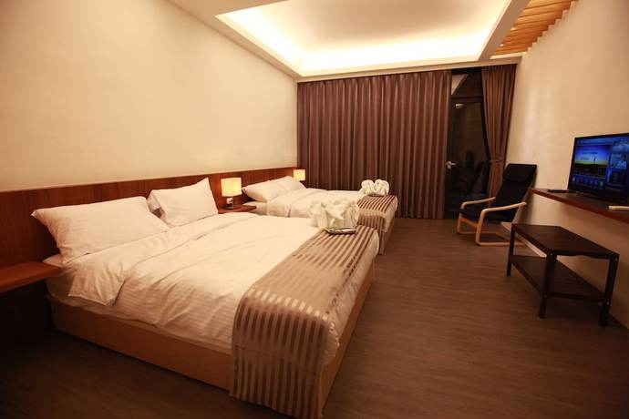 Imagen de la habitación del Hotel Bai Ji Yi. Foto 16