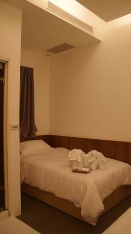 Imagen de la habitación del Hotel Bai Ji Yi. Foto 17